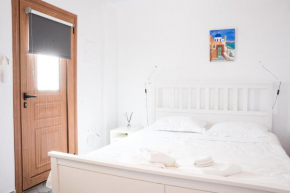 Fira Central Budget Rooms and Kitchen